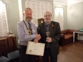 Roy Ivory receives Individual Community Award from President Francis Ulrych